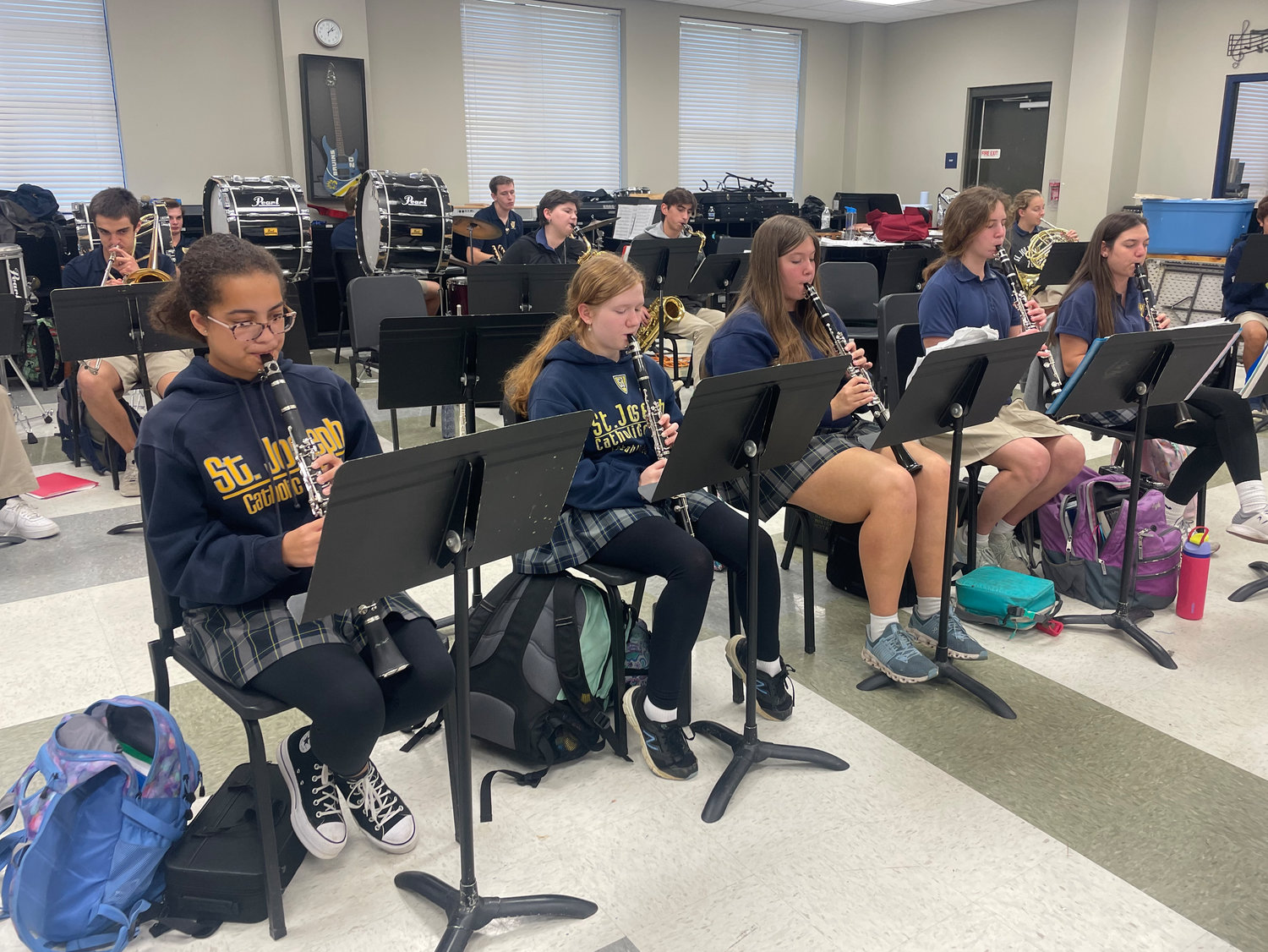 Student musicians practice for the 2022 edition of “Gifts of the Season.” Pictured, from left (front row): Lauryn Blue, Anya Klein, Melanie Moody, Angela Bethea and Lauren Abadie. Back row: Atticus Gomez, left, Lockard Williams, Mary Lee Topik, Jameson Clancy and Madalyn Weisenberger.